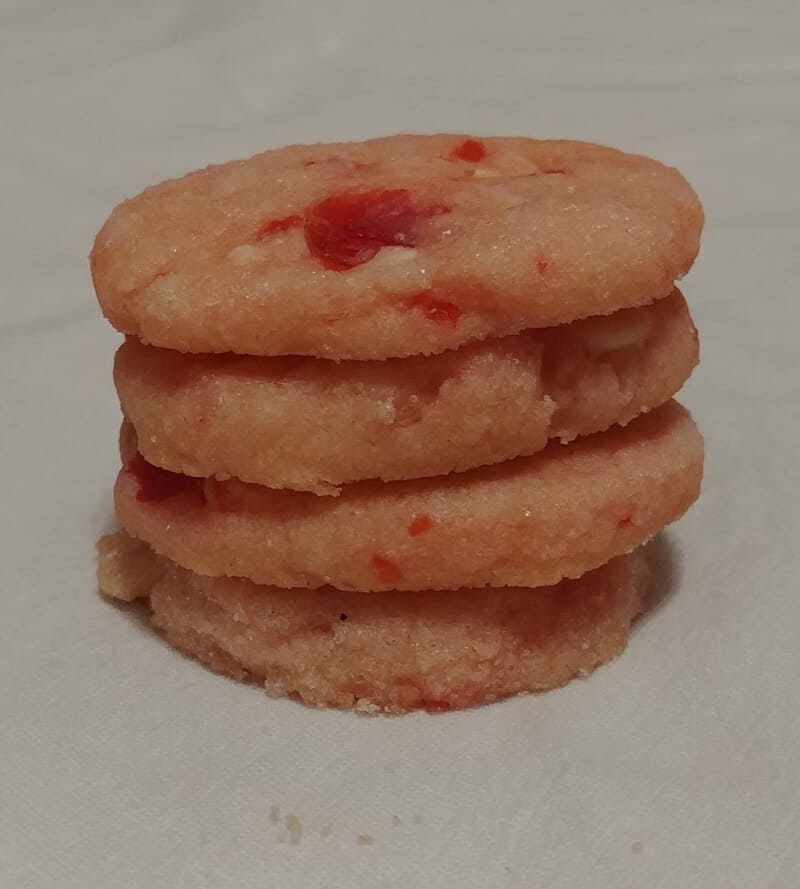 white chocolate cherry shortbread cookies, stacked