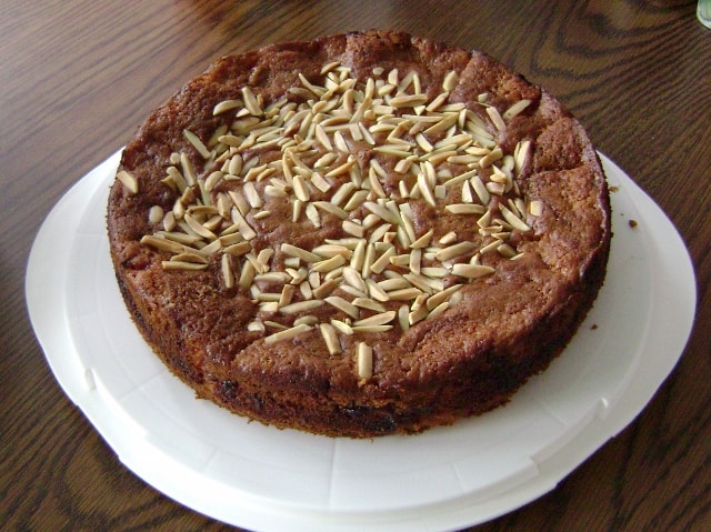 a whole Cherry-Almond Coffee Cake on a cake plate
