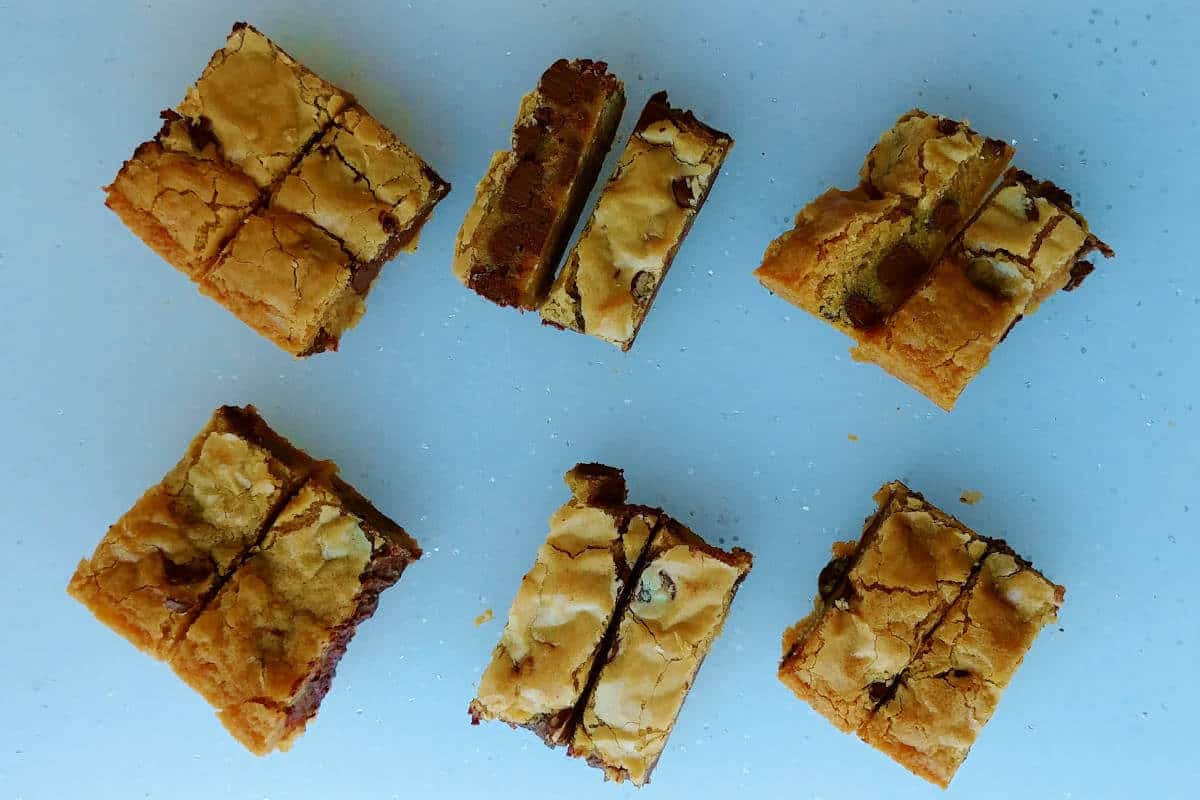 chocolate chip cookie bars, cut and lined in a row