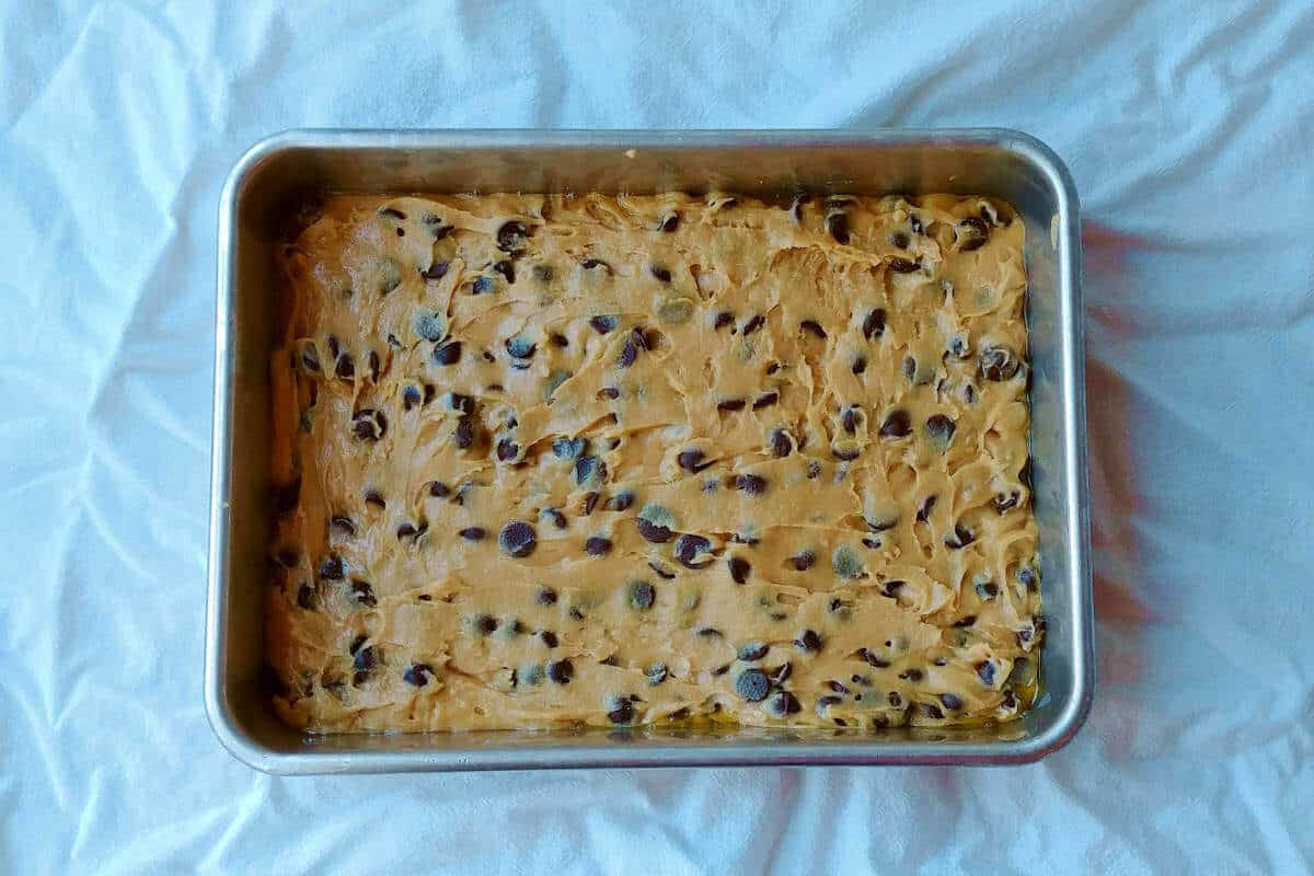 chocolate chip cookie bar dough, in a pan