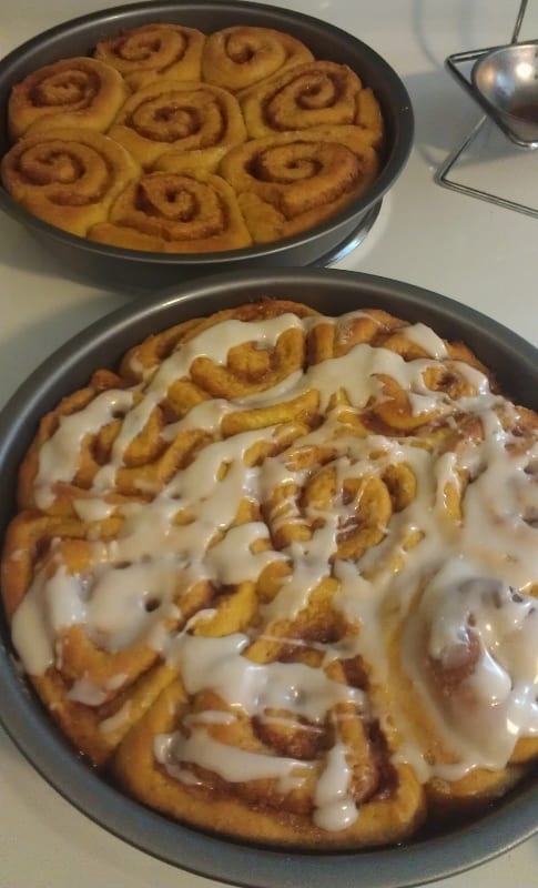 pumpkin cinnamon rolls, baked and in the pans