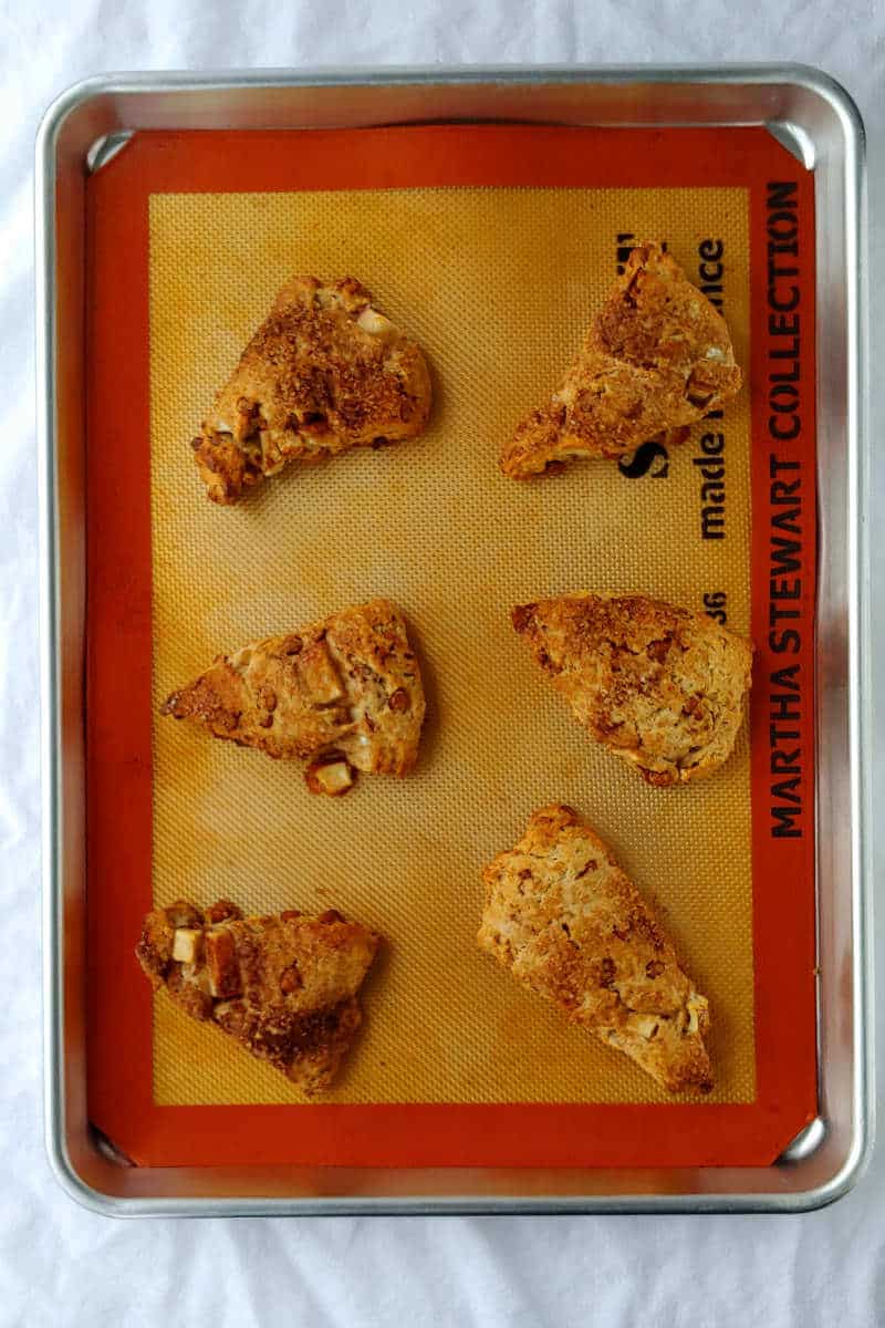 fresh apple cinnamon scones, freshly baked and on the baking sheet