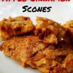 fresh apple cinnamon scones, on a plate, with one torn open - pin for pinterest
