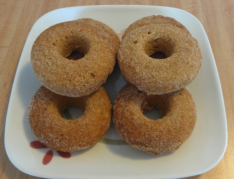 gluten-free baked donuts, stacked on a plate