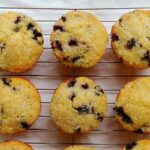 perfect blueberry muffins, on a baking rack, in rows, seen from overhead