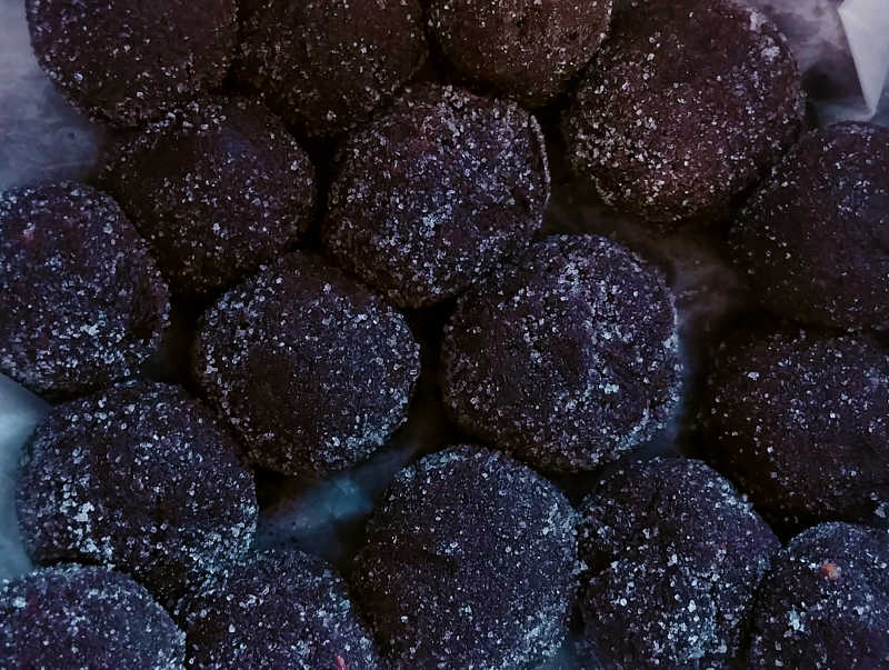 fudgy bourbon balls, coated with granulated sugar