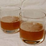 two whiskey sherry cocktails, in short glasses