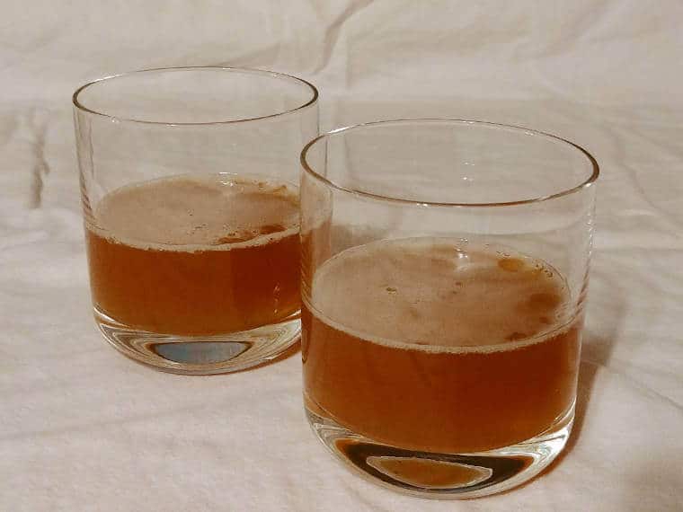 two whiskey sherry cocktails, in short glasses
