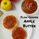 no-sugar-added slow cooker apple butter, in a bowl and on english muffins, with apples around them - pin for Pinterest