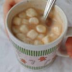 a mug of cocoa made from alton brown's hot cocoa mix, topped with marshmallows