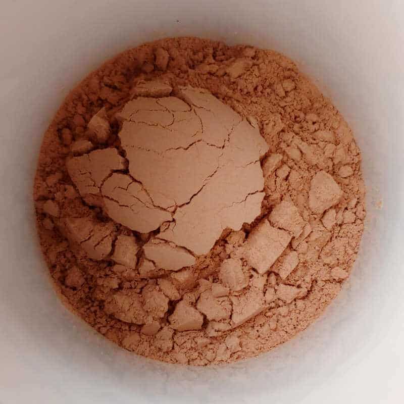 cocoa mix for Alton Brown's hot cocoa mix, in a mug, after being ground to a fine powder