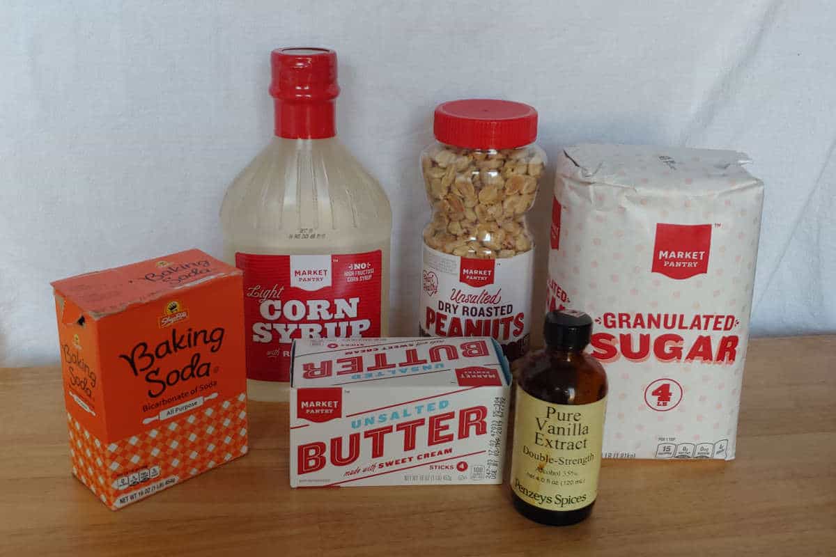 ingredients for microwave peanut brittle (corn syrup, sugar, butter, peanuts, vanilla, baking soda)