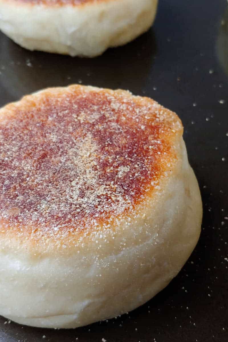 an English muffin on a griddle