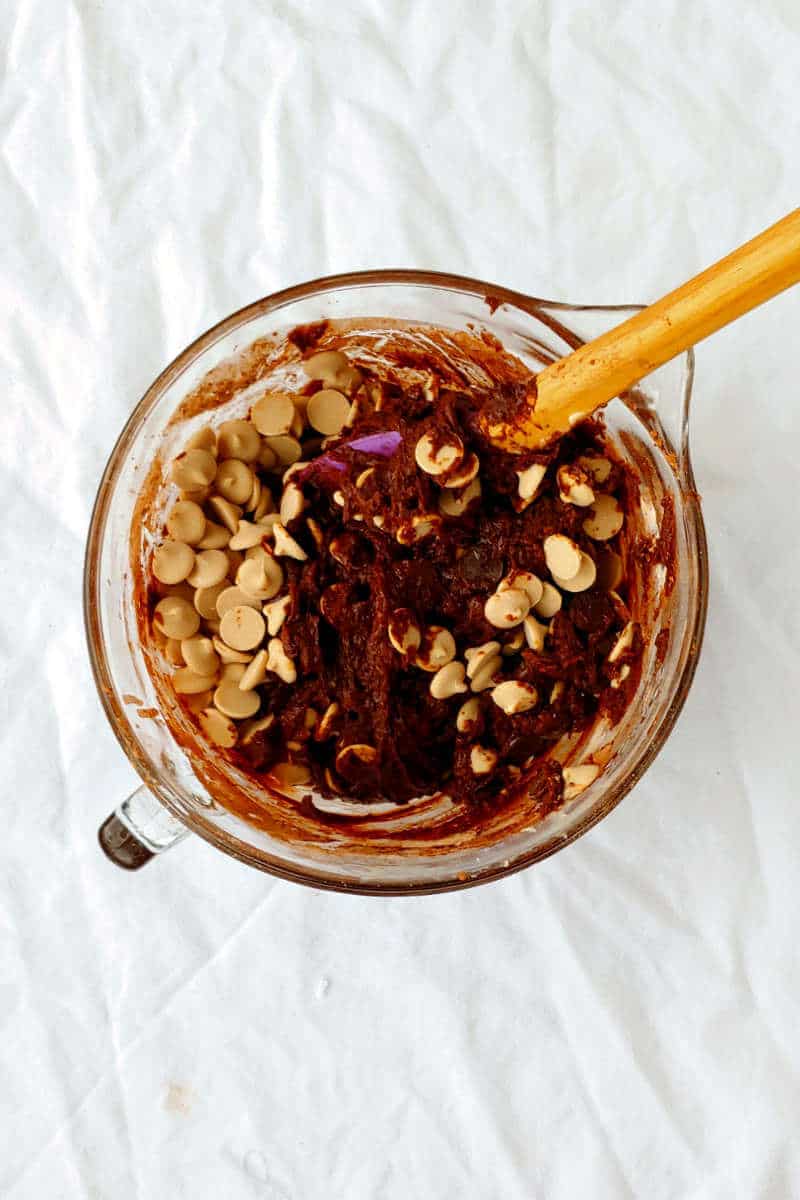 cookie dough with caramel chips partially mixed in