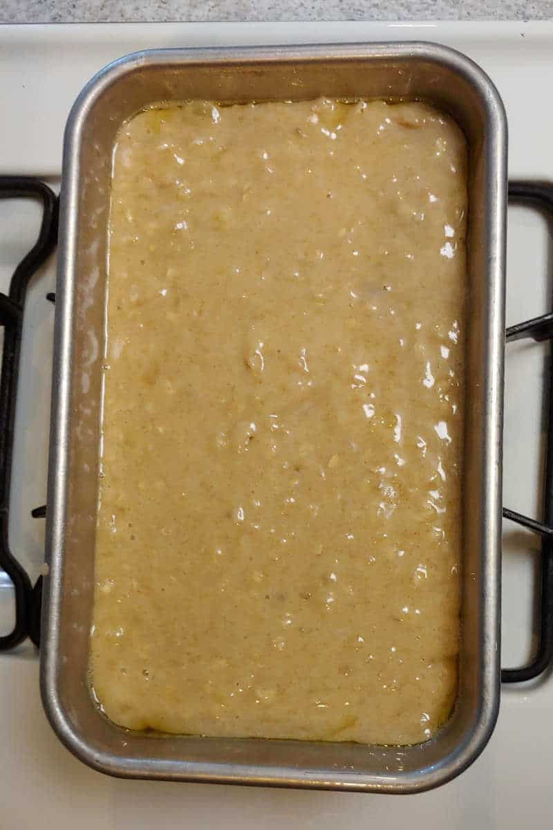 batter for banana bread, in a loaf pan