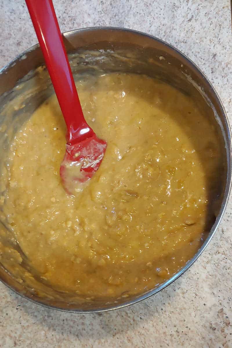 batter for banana bread, in a mixing bowl