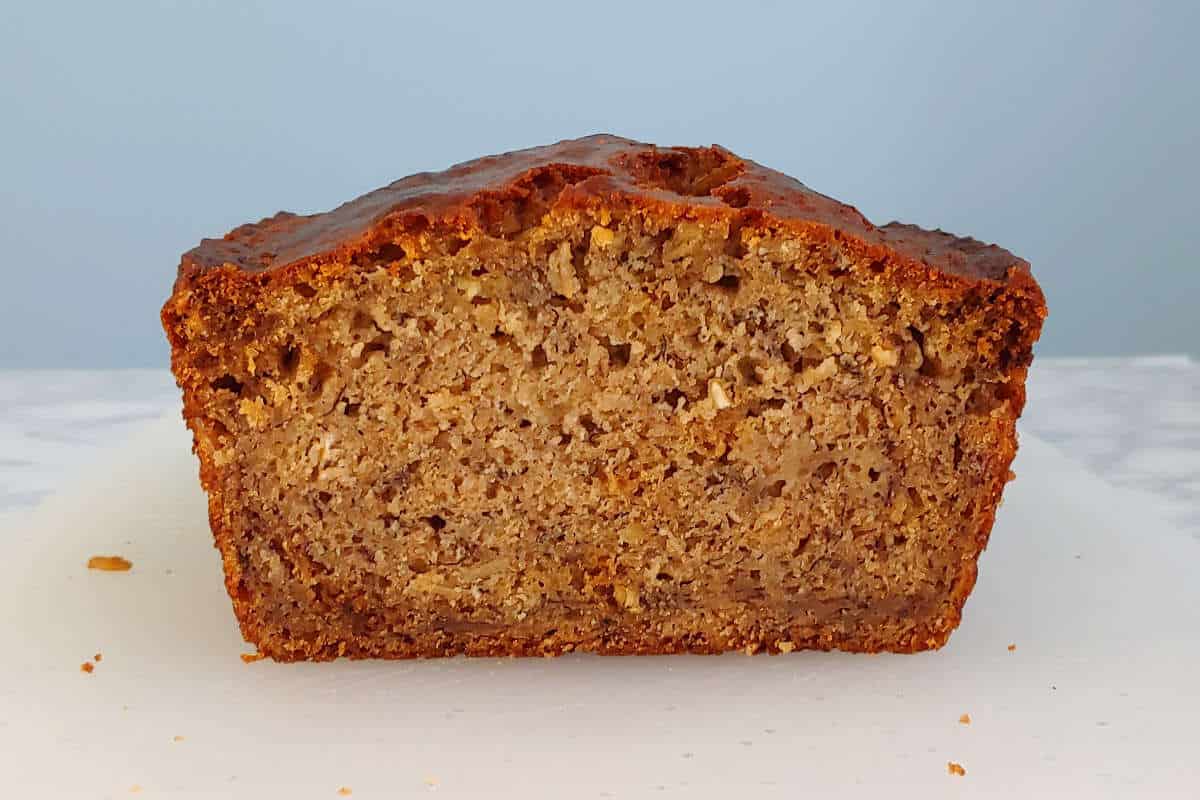 a cut loaf of banana bread, seen from the side