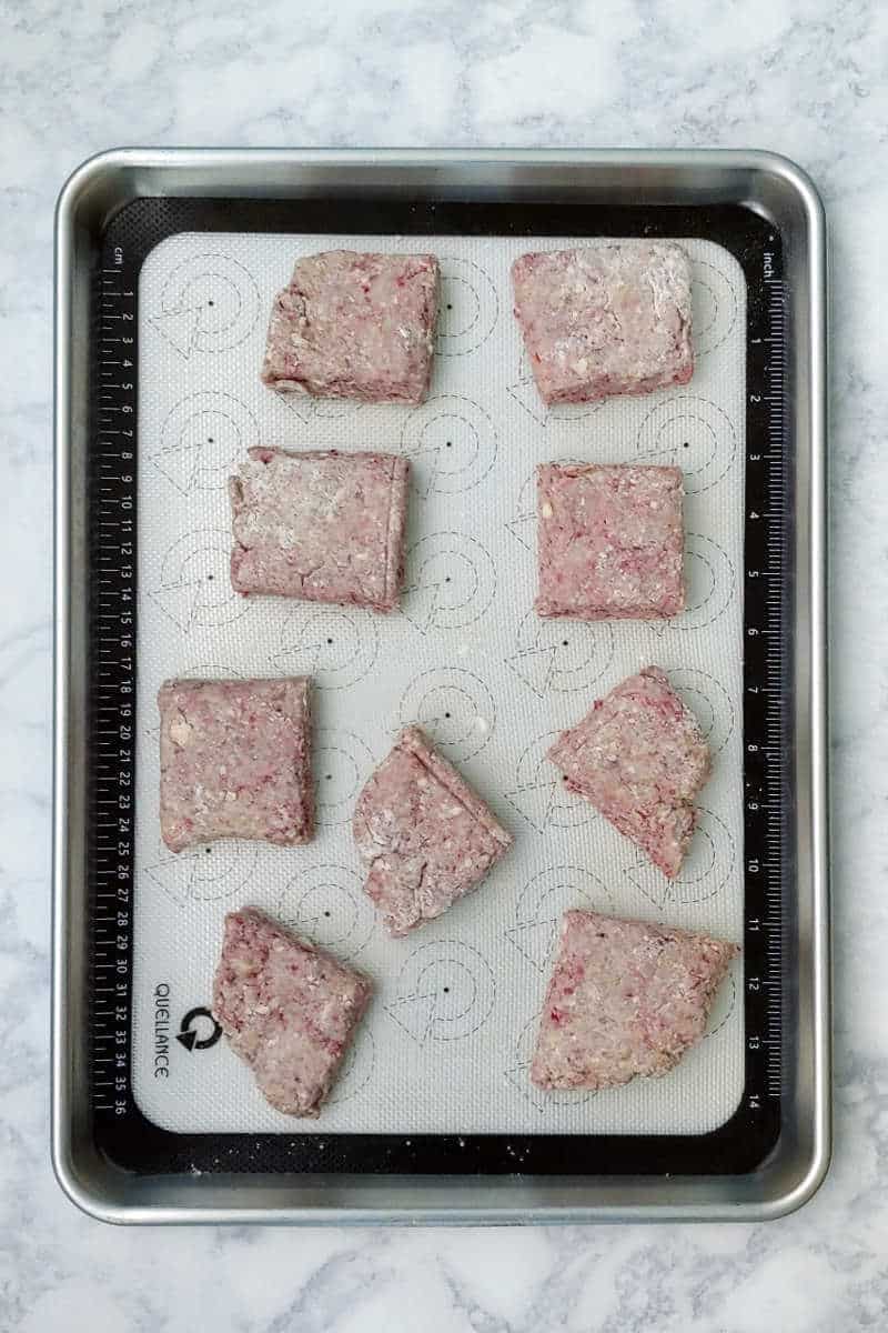 scone dough, separated into wedges on a baking sheet