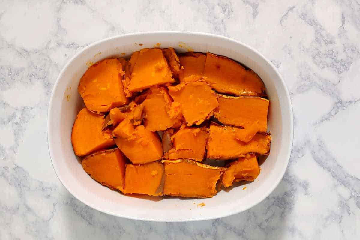 roasted sweet potatoes, cut and placed face up in a baking dish