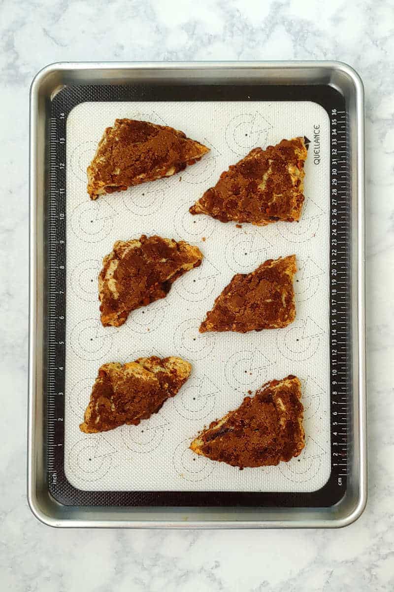 cinnamon scones, on a baking sheet before baking