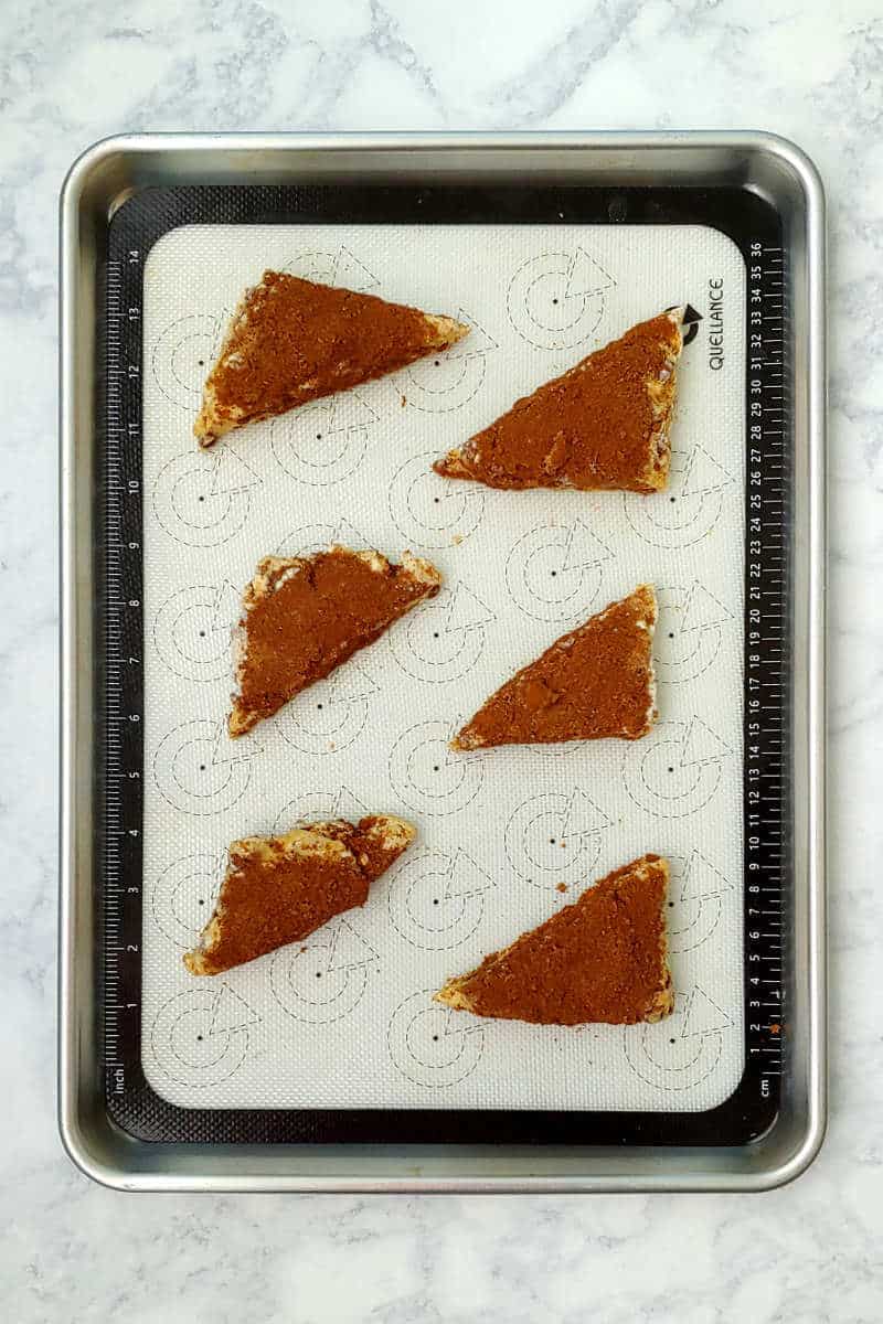 cinnamon scones, on a baking sheet before baking