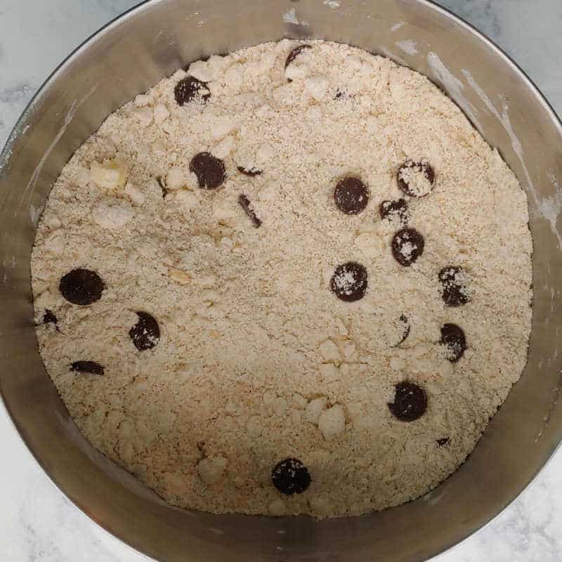 dry ingredients with bits of butter and chocolate chips