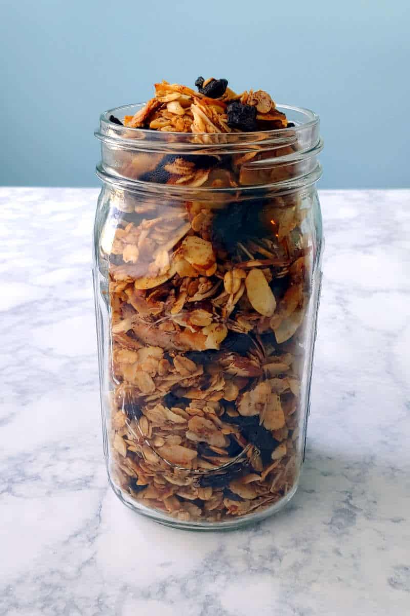 cherry, almond, and cinnamon granola, in a mason jar