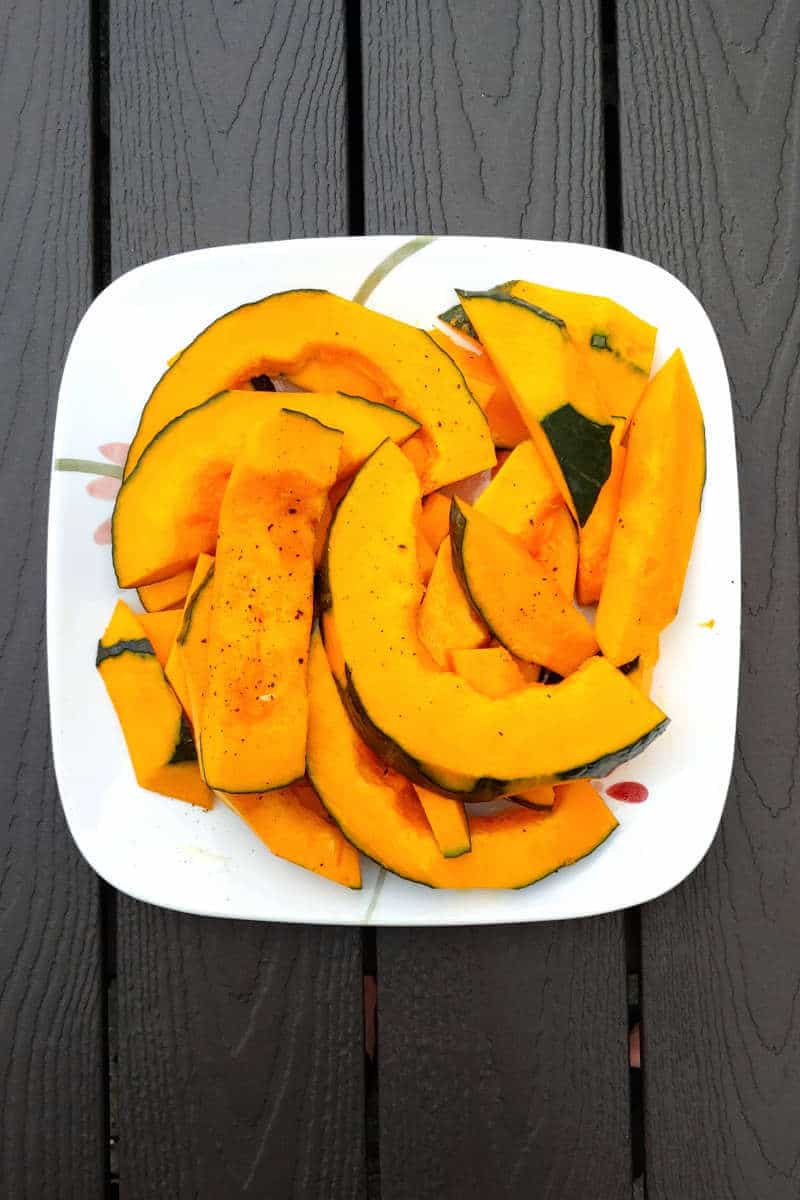 sliced and oiled slices of winter squash