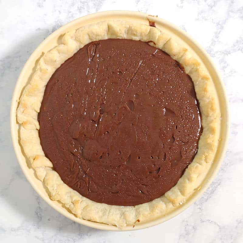chilled chocolate pie, plastic wrap removed, no topping