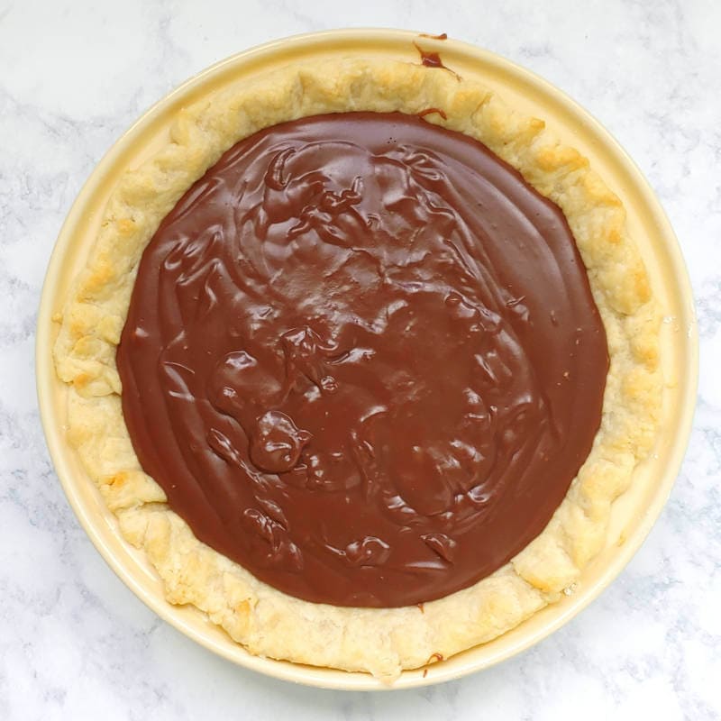 chocolate pie filling after being poured into the shell
