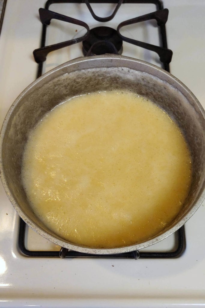 milk, butter, and sugar syrup, having settled in the pan after boiling
