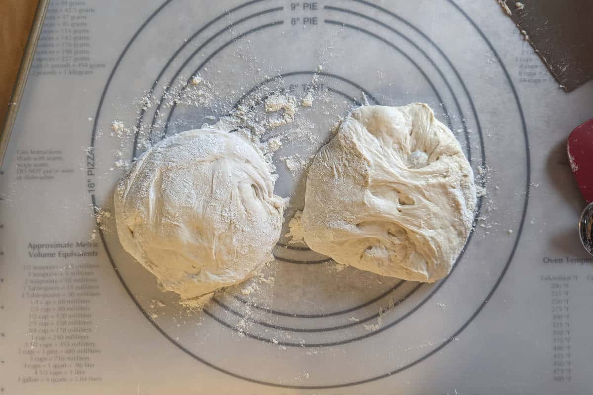 italian bread dough, separated into two balls