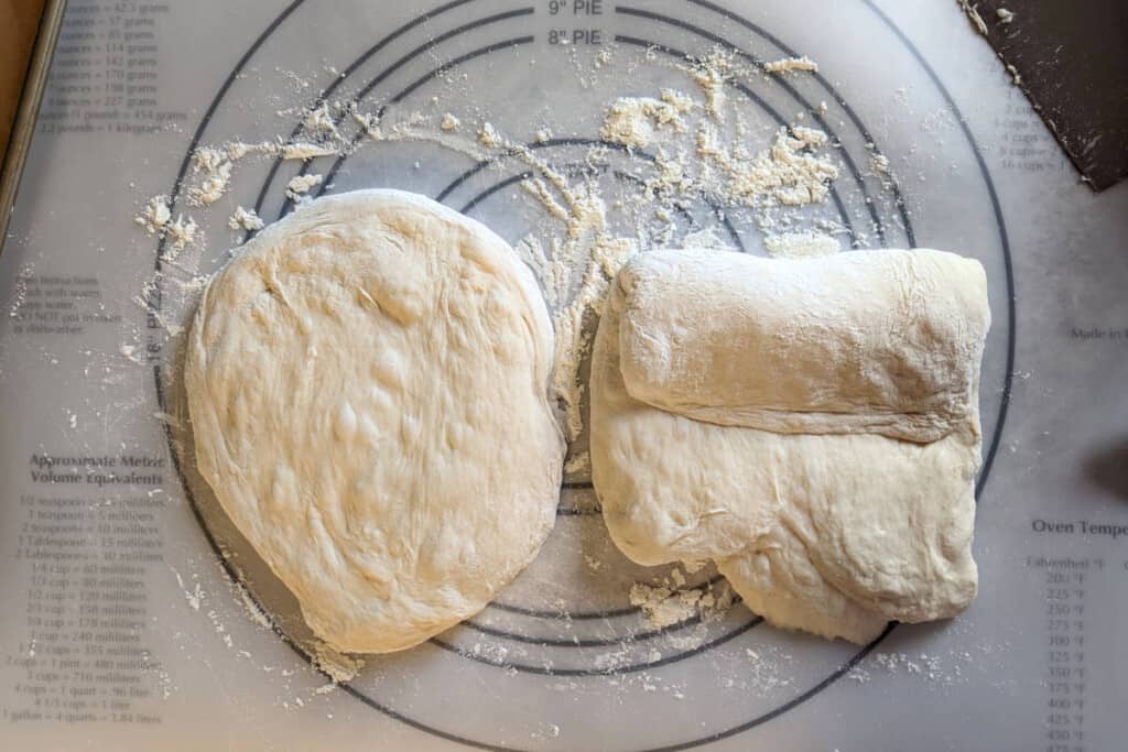 bread dough patted down, with the top third folded over the middle third