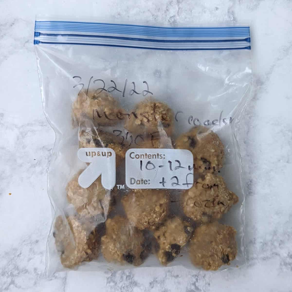 a freezer bag with dough for monster cookies