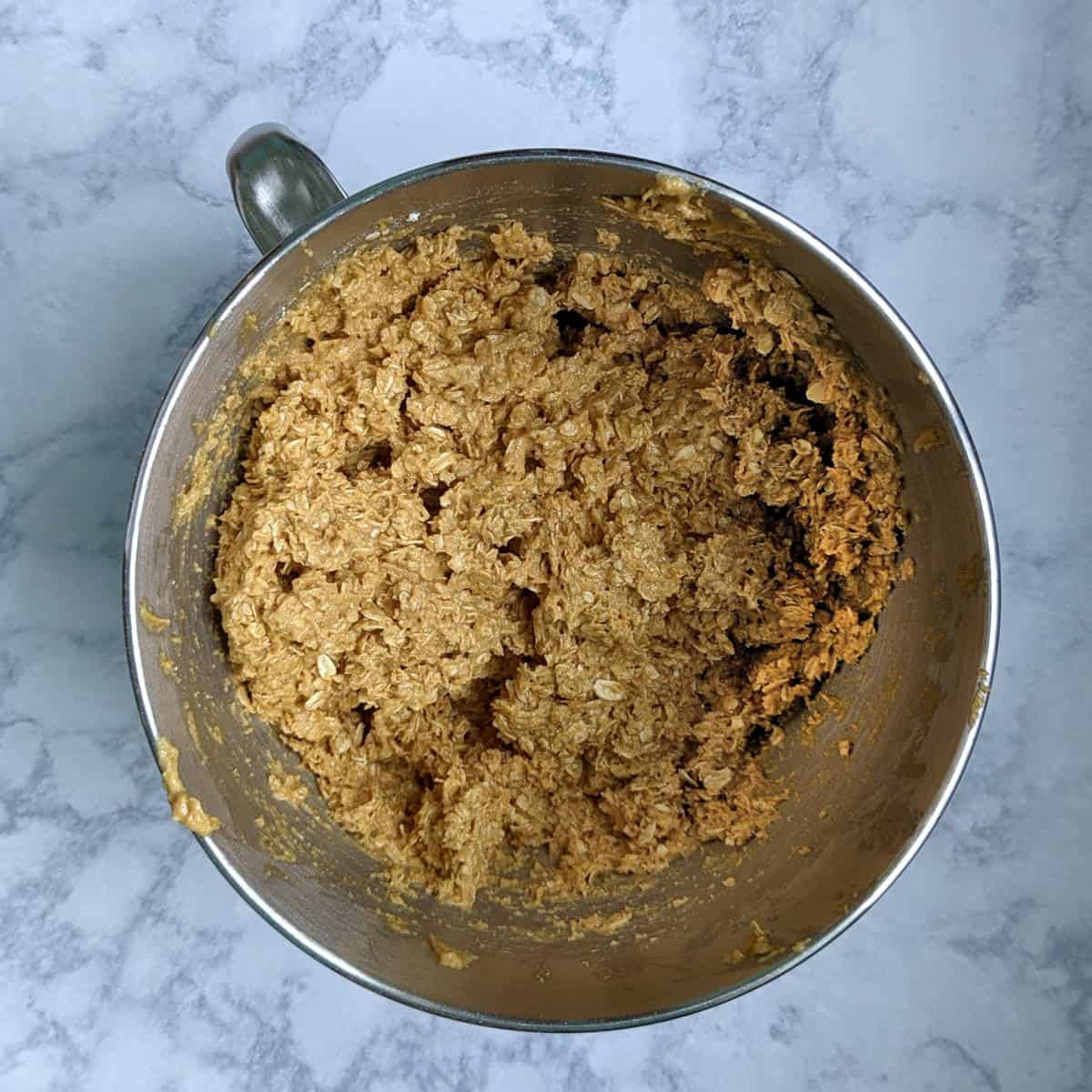 dough for monster cookies, in the bowl of a stand mixer