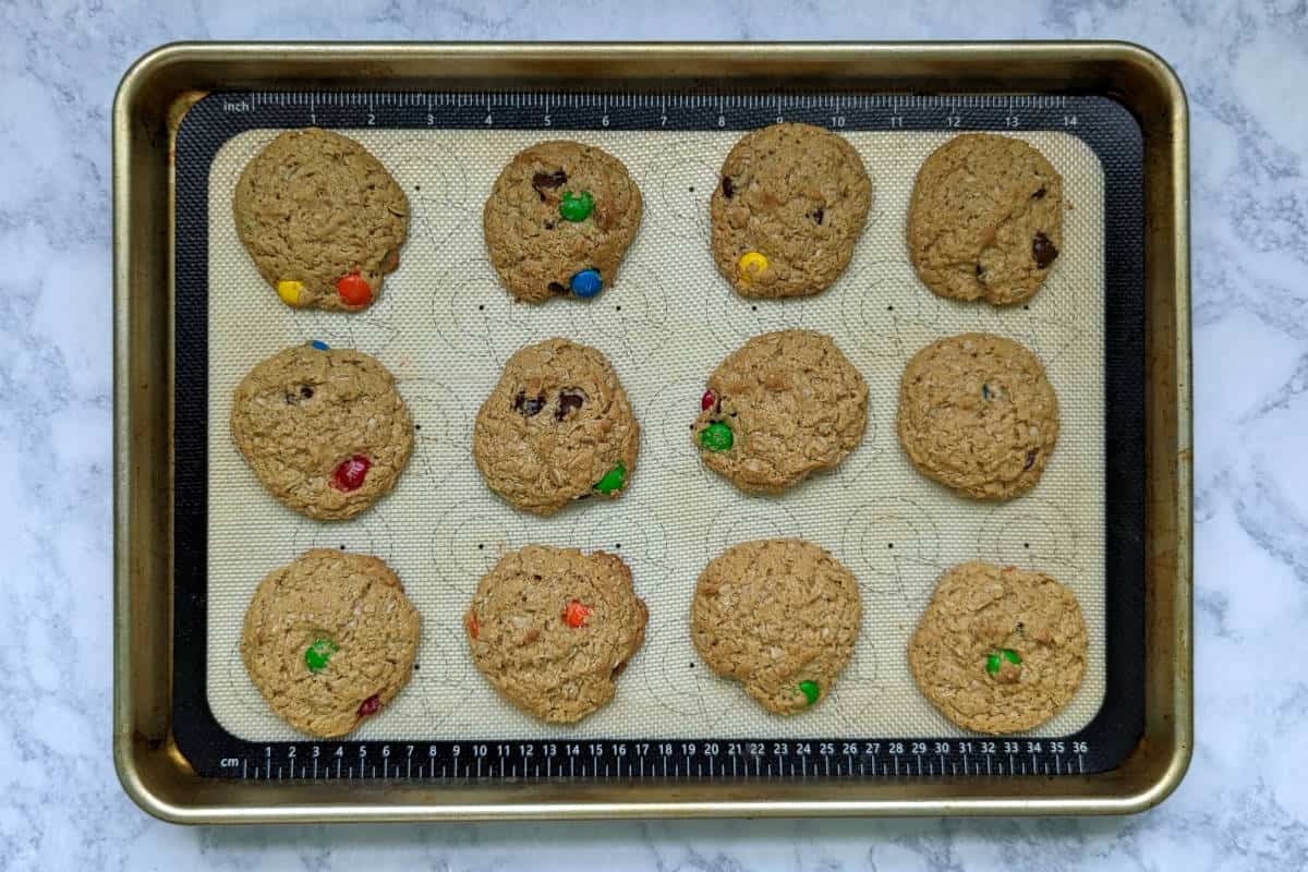 monster cookies, baked, on the baking sheet