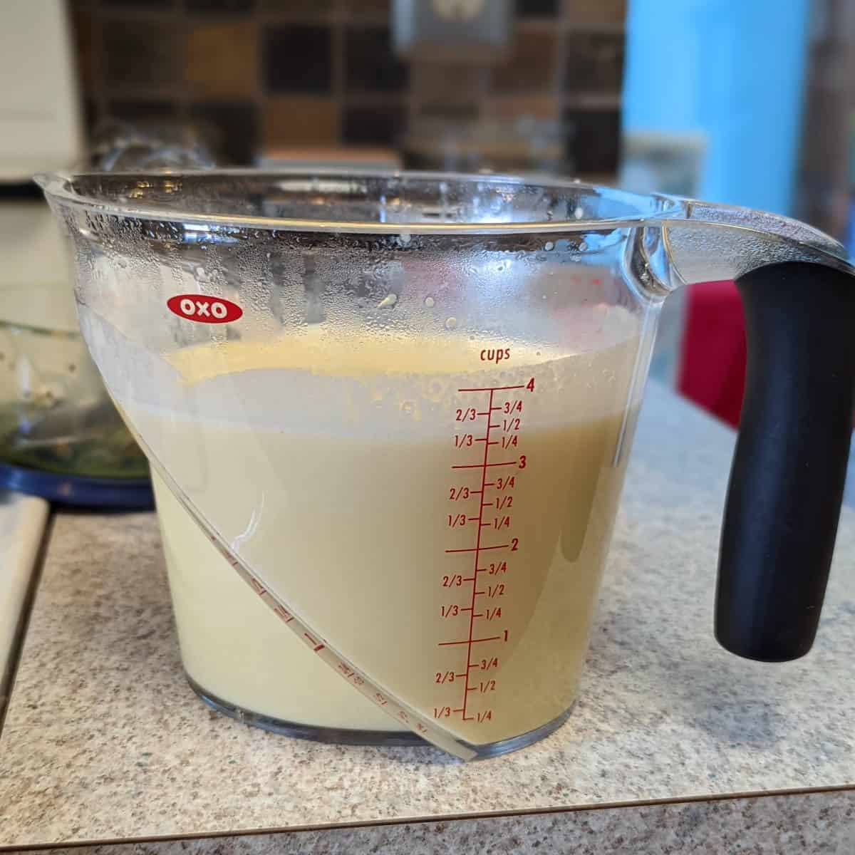 ice cream batter in measuring cup
