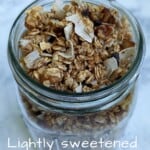 homemade granola with coconut and walnuts in a mason jar, with text overlay