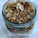 homemade granola with coconut and walnuts, in a mason jar - Pin for Pinterest