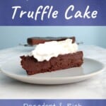 slice of chocolate truffle cake with whipped cream, with text overlay for Pinterest