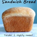 loaf of yeasted banana sandwich bread with text overlay for Pinterest