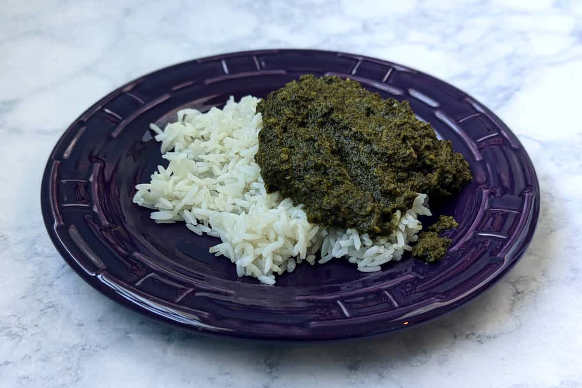 saag over rice on a plate