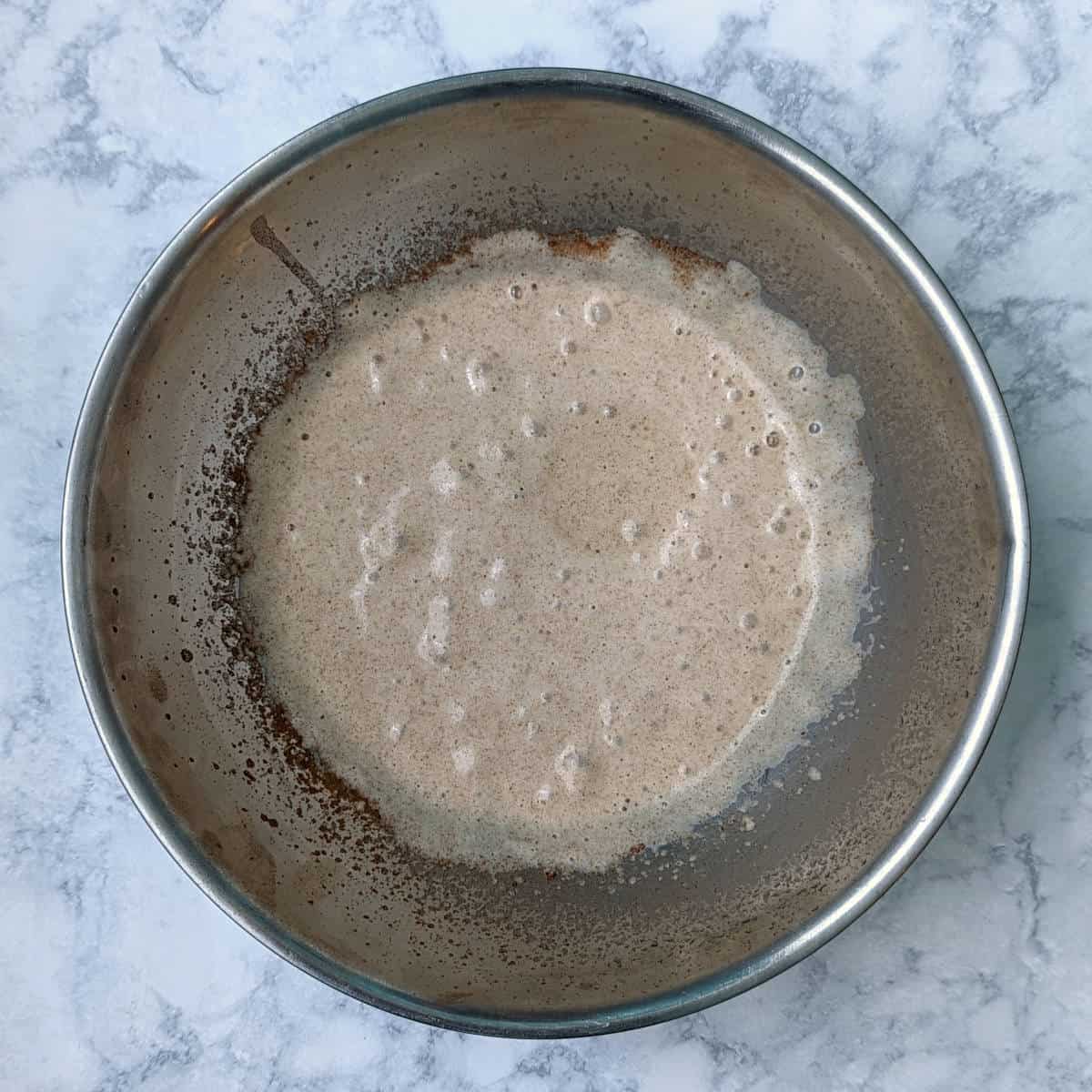 whipped aquafaba with maple syrup and cinnamon mixed in