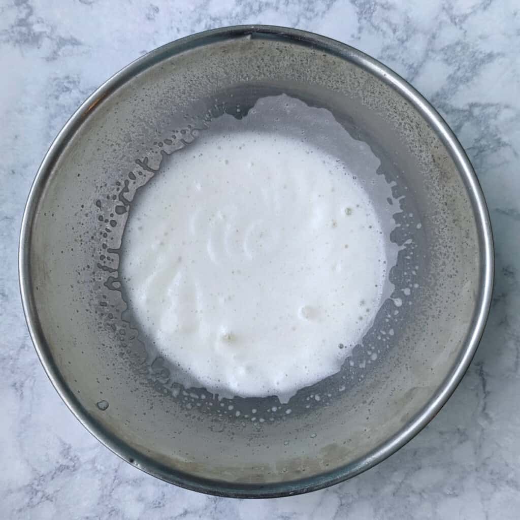 liquid from a can of chickpeas, whipped until white and foamy