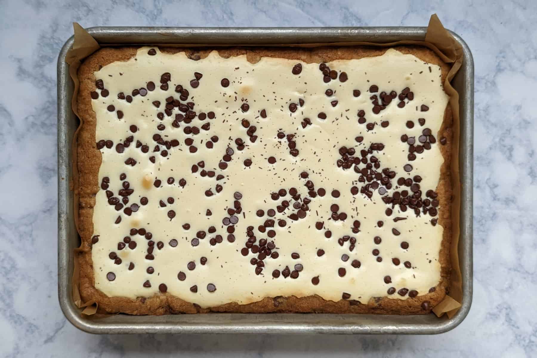 cheesecake bars, with cookie edge, after baking