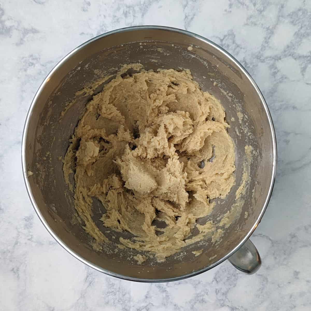 wet ingredients for cookies, creamed together in a stand mixer bowl