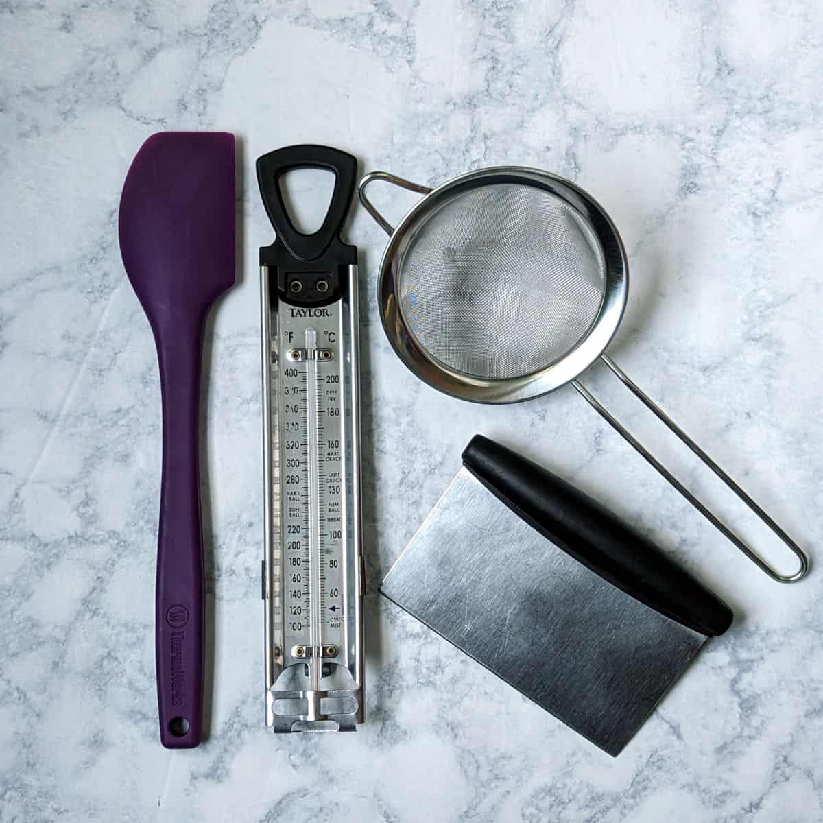 rubber spatula, candy thermometer, sifter, bench scraper