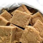 peanut butter fudge squares in a tin