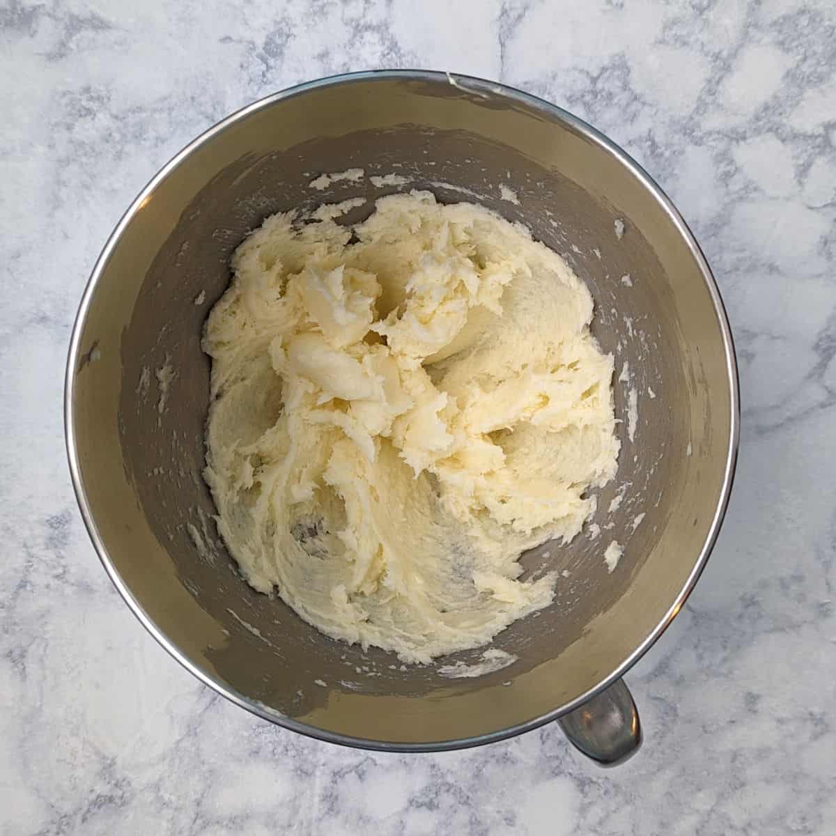 butter and sugar, creamed together in the bowl of a stand mixer