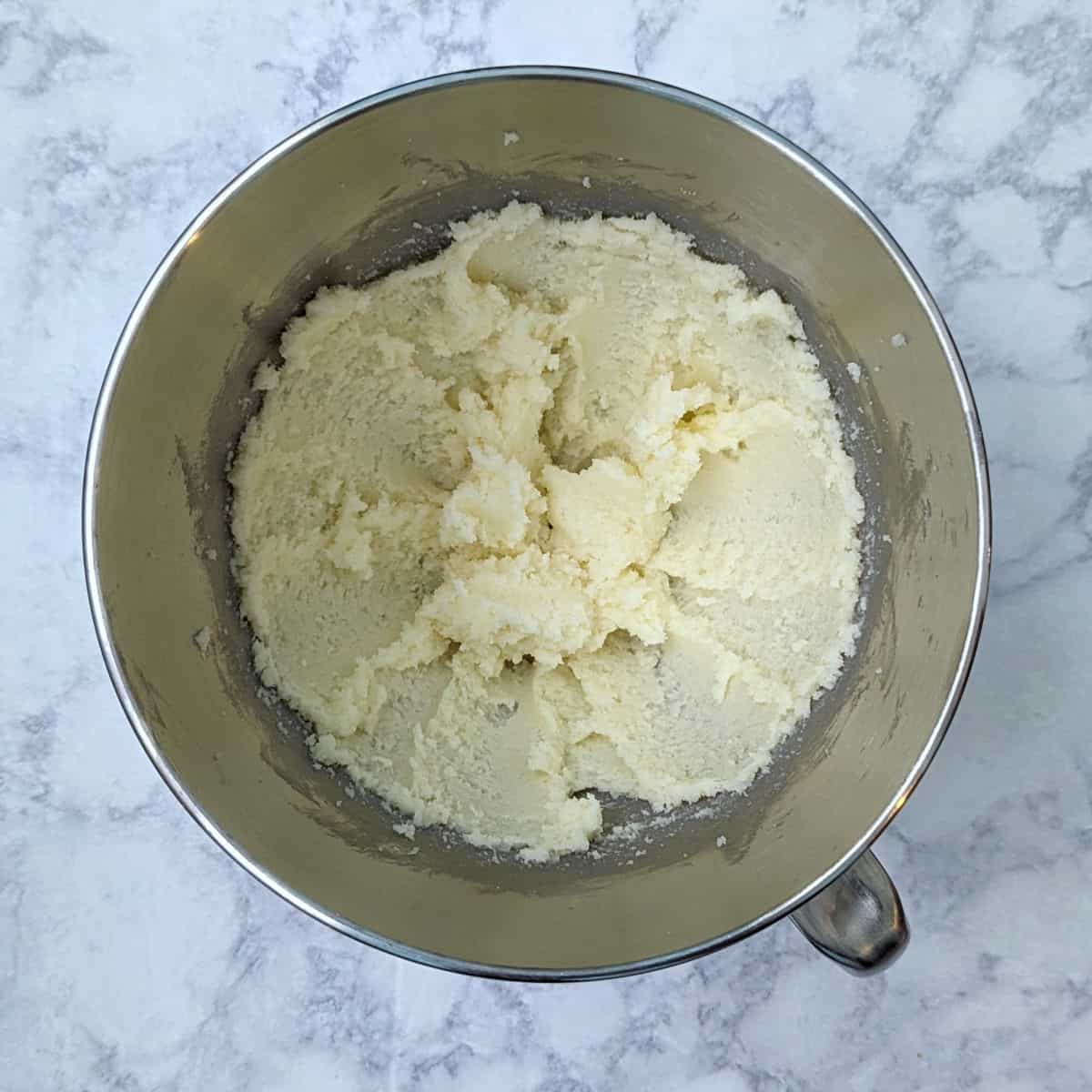 creamed butter and sugar in a stand mixer bowl for gooey batter